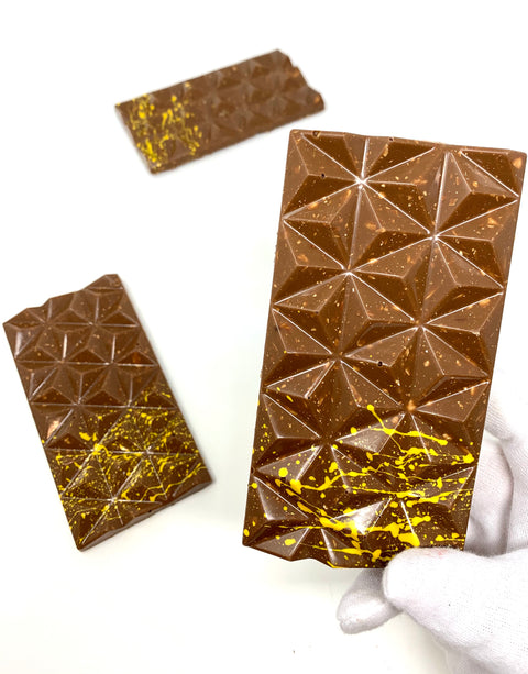 36% Caramélia Almond Bar - #Chocolate4Change - Cocoa40 Inc. - Extraordinary Gourmet Chocolate Gifts in Toronto! Our chocolates, confections and gelato are made by hand in Newmarket, Ontario. Shop small and support local.